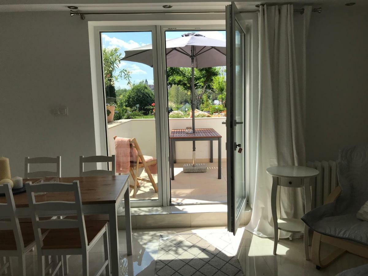 Apartament " Pod Niebieskim Pagajem " Mrągowo Extérieur photo